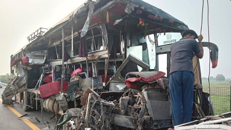 Kitchen Bus Crash A double-decker bus collides with a milk truck, killing at least 18 people