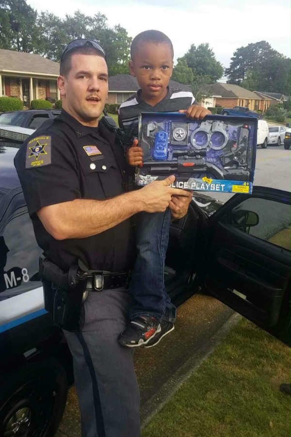 Deputy Powell and R.J. (Source: Jasmine Mahone)